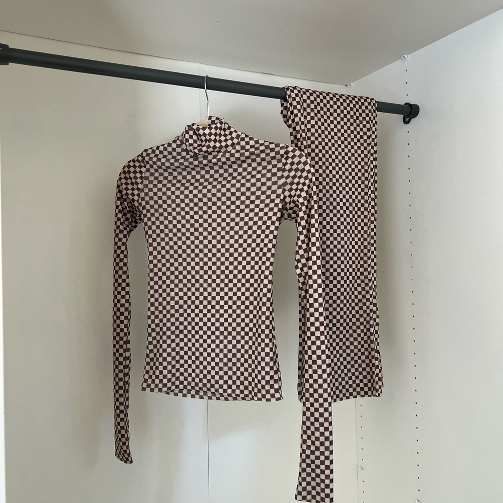 Nanushka checkered long sleeve Harri Checked Mesh Turtleneck Top wide leg pants